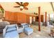 Outdoor living space with comfortable seating and stone flooring offers a peaceful retreat at 1105 River Laurel Dr, Suwanee, GA 30024