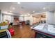 Large finished basement game room features open layout and versatile space for recreational activities at 1105 River Laurel Dr, Suwanee, GA 30024