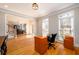 Bright office space with hardwood floors and large windows providing natural light at 1105 River Laurel Dr, Suwanee, GA 30024
