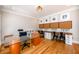 Large home office with built-in desks and storage, perfect for multiple workstations at 1105 River Laurel Dr, Suwanee, GA 30024