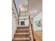 Well-maintained staircase leading to the upper level of the home at 1105 River Laurel Dr, Suwanee, GA 30024