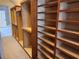 Spacious closet area complete with plenty of shelving for optimal storage solutions at 1105 River Laurel Dr, Suwanee, GA 30024