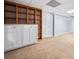 Spacious basement area with built-in shelving and plenty of room for storage at 180 Butterfield Ln, Fayetteville, GA 30214