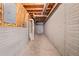 Unfinished basement with block walls and exposed ceiling at 180 Butterfield Ln, Fayetteville, GA 30214
