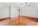 Spacious bedroom with hardwood floors, ceiling fan and closet space at 180 Butterfield Ln, Fayetteville, GA 30214