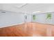 Large living room with tile ceiling and hardwood floors at 180 Butterfield Ln, Fayetteville, GA 30214