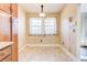 Bright dining area with tile flooring and a charming window letting in natural light at 2211 Jonathan Ave, Lithonia, GA 30058
