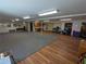 Large finished basement with half carpet and half hardwood floors, plus painted ceilings and neutral walls at 395 Russell Sw Dr, Smyrna, GA 30082