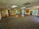 This spacious interior features a kitchenette area and ample natural light, perfect for an office at 395 Russell Sw Dr, Smyrna, GA 30082