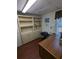 A cozy office features built-in shelves, a functional desk, and natural light, perfect for productivity at 395 Russell Sw Dr, Smyrna, GA 30082