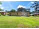 Expansive backyard featuring mature trees and ample space for recreation and entertaining at 624 Lyle Se Dr, Marietta, GA 30067