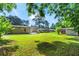 Large backyard with well-maintained lawn, offering plenty of space for outdoor activities at 624 Lyle Se Dr, Marietta, GA 30067