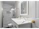 Modern bathroom features marble countertops, updated vanity, and a walk-in shower at 624 Lyle Se Dr, Marietta, GA 30067