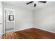 Bedroom features hardwood floors with an attached bathroom at 624 Lyle Se Dr, Marietta, GA 30067