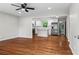 Open-concept kitchen featuring new stainless steel appliances and hardwood floors at 624 Lyle Se Dr, Marietta, GA 30067