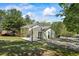 The back exterior features a wooden deck with outdoor seating, great for enjoying the outdoors at 1007 Wayne Dr, Snellville, GA 30078