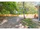 Spacious backyard featuring a concrete patio and a newly installed wooden fence at 1967 West John Calvin Ave, Atlanta, GA 30337