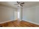 Spacious bedroom with hardwood floors and neutral color palette at 1967 West John Calvin Ave, Atlanta, GA 30337