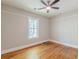 Bedroom featuring hardwood floors and a bright window at 1967 West John Calvin Ave, Atlanta, GA 30337