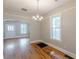 Dining room with hardwood floors and a chandelier at 1967 West John Calvin Ave, Atlanta, GA 30337