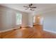 Bright living room with hardwood floors and large window at 1967 West John Calvin Ave, Atlanta, GA 30337