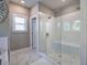 Bathroom includes a glass door shower with a built-in seat at 2657 Cedar Pine Way, Atlanta, GA 30360