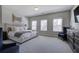 Bedroom with dresser and seating; lots of natural light at 2657 Cedar Pine Way, Atlanta, GA 30360