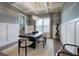 This dining room features a decorative chandelier and modern design touches at 2657 Cedar Pine Way, Atlanta, GA 30360