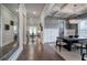 Elegant dining area with stylish chandelier, dark wood floors, and an open layout for seamless entertaining at 2657 Cedar Pine Way, Atlanta, GA 30360