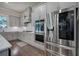 Modern kitchen with stainless steel appliances and gray cabinets at 2657 Cedar Pine Way, Atlanta, GA 30360