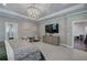 Luxurious main bedroom with elegant lighting and comfortable sitting area at 2657 Cedar Pine Way, Atlanta, GA 30360