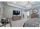 Large main bedroom featuring neutral tones and a sophisticated chandelier at 2657 Cedar Pine Way, Atlanta, GA 30360