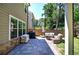 Covered patio with ample seating, perfect for outdoor entertaining and relaxation at 2657 Cedar Pine Way, Atlanta, GA 30360