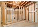 Unfinished basement with wooden framing for walls and exposed ceiling at 2865 Bryant Ct, Cumming, GA 30040