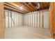 Unfinished basement with wooden framing for walls and concrete floor at 2865 Bryant Ct, Cumming, GA 30040