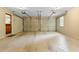 Spacious two-car garage with interior view and wooden paneled doors at 2865 Bryant Ct, Cumming, GA 30040