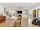 Open living room featuring a fireplace, built-in shelving, and sliding glass doors to seamlessly blend indoor/outdoor living at 704 Rock Springs Rd, Lawrenceville, GA 30043