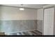Inviting room with paneled walls and stylish wood-look flooring at 710 Singing Hills Ct, Roswell, GA 30076