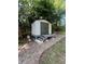 Outdoor storage shed on a paved pathway at 710 Singing Hills Ct, Roswell, GA 30076