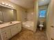 Bathroom featuring a single sink, bathtub and shower combo at 1050 Redan Trce, Stone Mountain, GA 30088