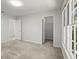 Bedroom with large windows, and access to a walk-in closet at 1050 Shady Valley Pl, Atlanta, GA 30324