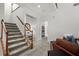 The foyer features a staircase, and opens to the main living room at 1050 Shady Valley Pl, Atlanta, GA 30324