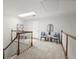 Landing area boasts two chairs and a side table with a view of the home office at 1050 Shady Valley Pl, Atlanta, GA 30324