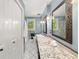 Charming bathroom with granite countertop, decorative mirrors, and tile flooring at 2272 Desmond Dr, Decatur, GA 30033