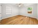 Bright, empty bedroom with hardwood flooring, ample natural light, and neutral paint at 2272 Desmond Dr, Decatur, GA 30033
