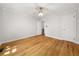 Spacious bedroom with hardwood flooring, a ceiling fan, and ample closet space at 2272 Desmond Dr, Decatur, GA 30033