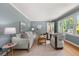 Bright living room featuring hardwood floors, neutral paint, and comfortable seating at 2272 Desmond Dr, Decatur, GA 30033