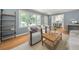 Bright living room with hardwood floors and open view to dining area at 2272 Desmond Dr, Decatur, GA 30033