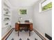 Bright office space with built-in shelving and a charming writing desk at 2272 Desmond Dr, Decatur, GA 30033