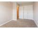 Bedroom featuring neutral walls, comfortable carpeting, and closet at 4544 Parkview Sq, Atlanta, GA 30349
